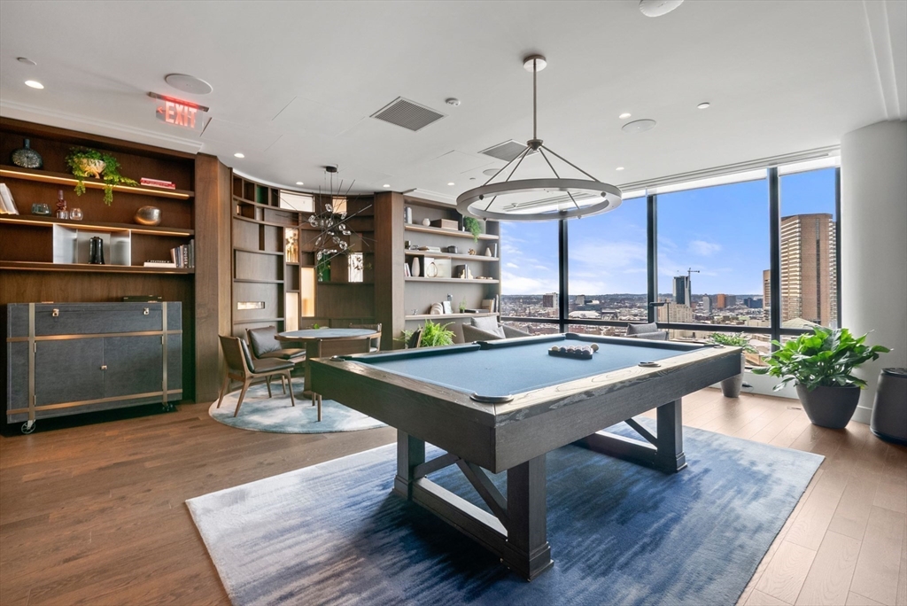 40 Trinity Place, Unit 1518 Boston, MA 02116 - Photo 17 of 25 a room with pool table and windows