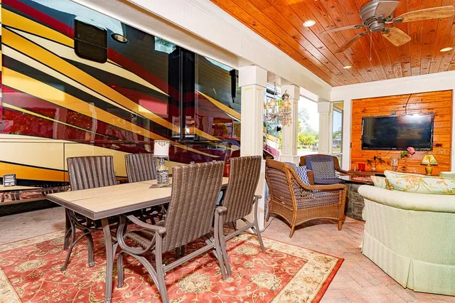 a kitchen with stainless steel appliances granite countertop a stove and a microwave