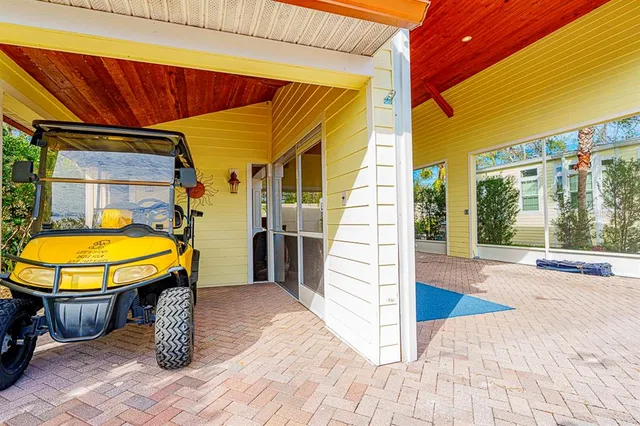 a view of a lobby with a porch and sitting area