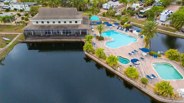 a living room with lots of furniture and wooden floor