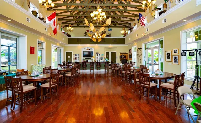 a view of a swimming pool with an outdoor seating