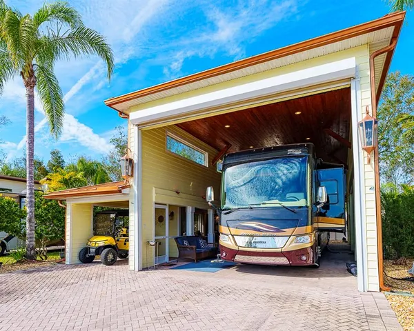 a view of car parked in back of house