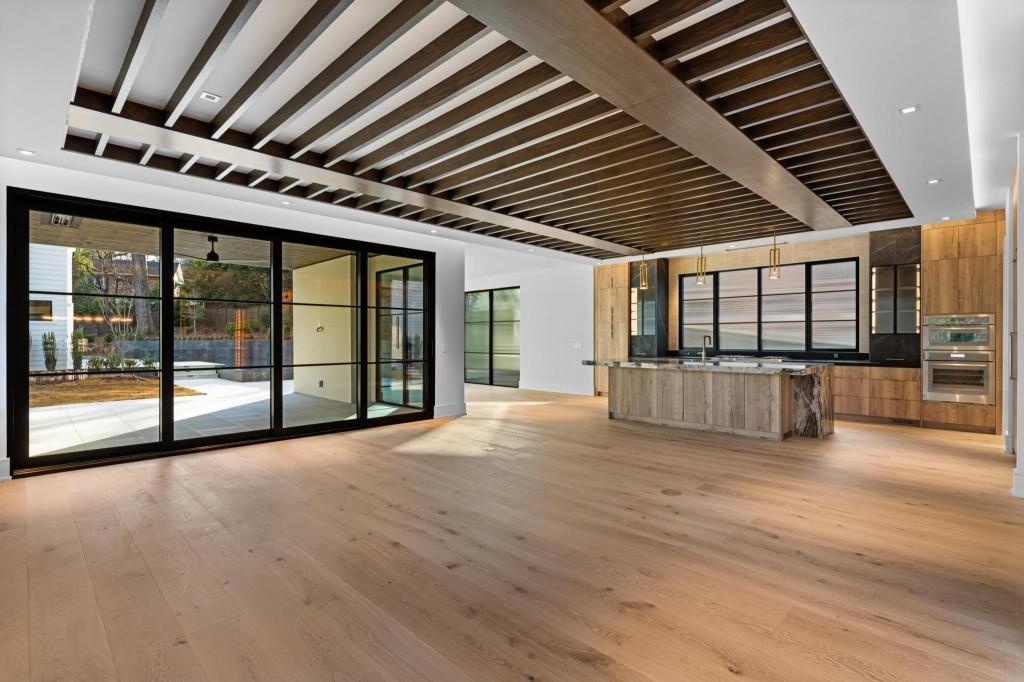 843 Yorkshire Road Northeast Atlanta, GA 30306 - Photo 11 of 65 a view of an empty room with a balcony