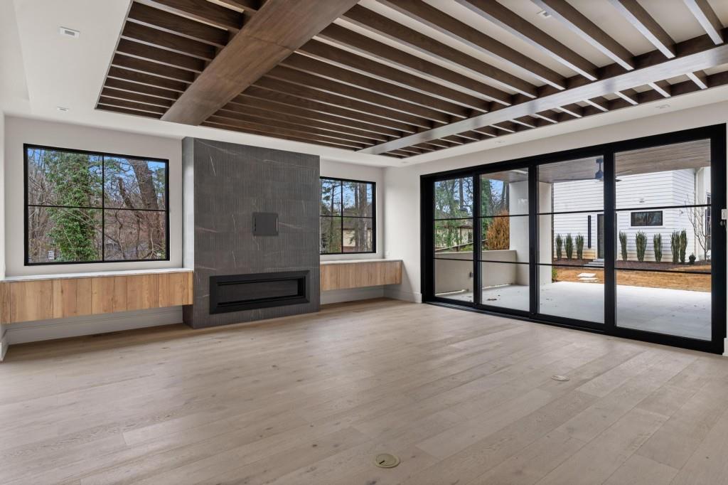 843 Yorkshire Road Northeast Atlanta, GA 30306 - Photo 12 of 65 a view of an empty room with a balcony