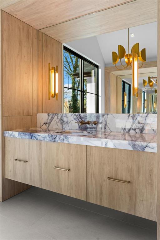 843 Yorkshire Road Northeast Atlanta, GA 30306 - Photo 40 of 65 a bathroom with a sink and a mirror