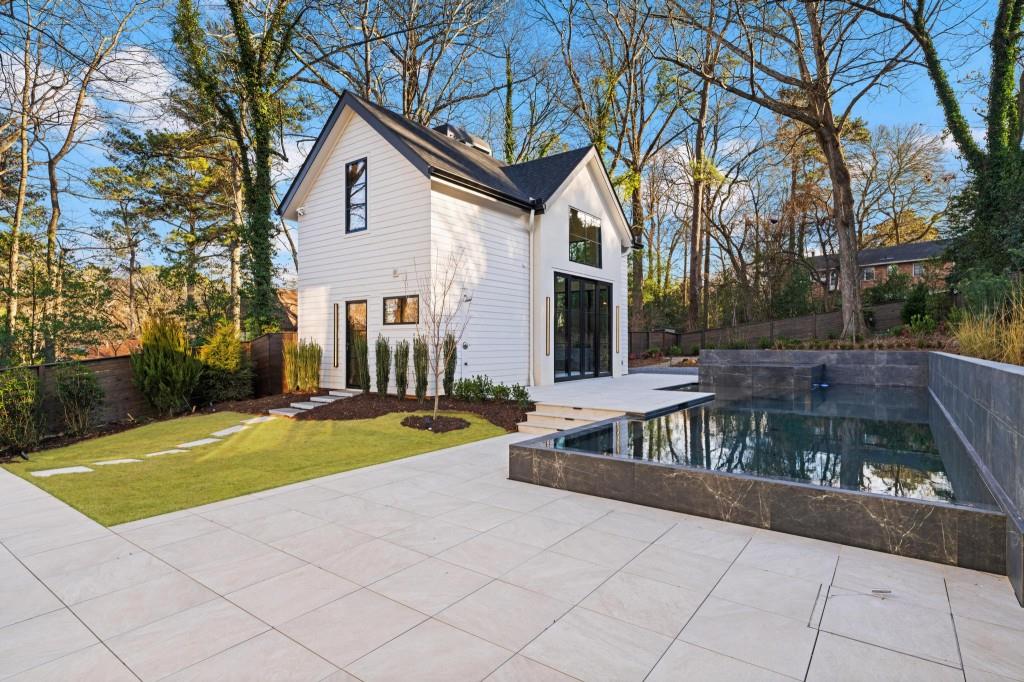 843 Yorkshire Road Northeast Atlanta, GA 30306 - Photo 45 of 65 a view of outdoor space yard and swimming pool