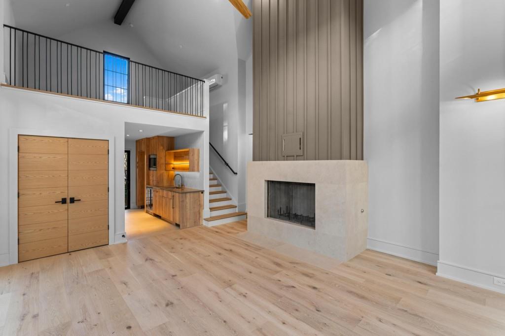843 Yorkshire Road Northeast Atlanta, GA 30306 - Photo 49 of 65 an empty room with wooden floor fireplace and windows