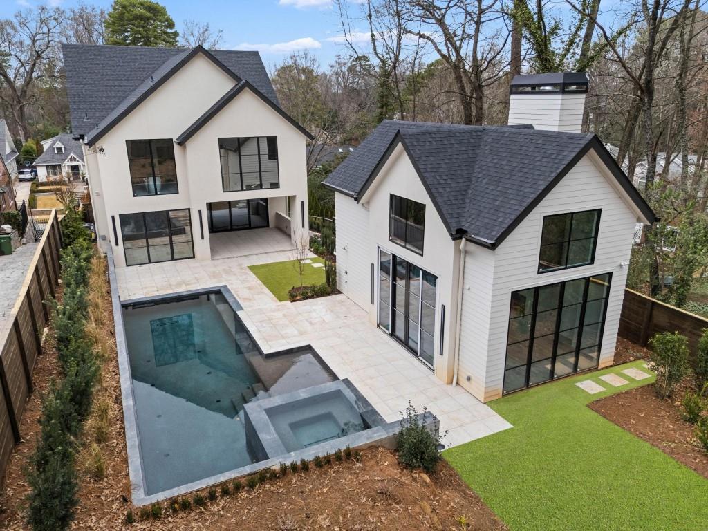 843 Yorkshire Road Northeast Atlanta, GA 30306 - Photo 52 of 65 a view of a house with wooden fence and backyard