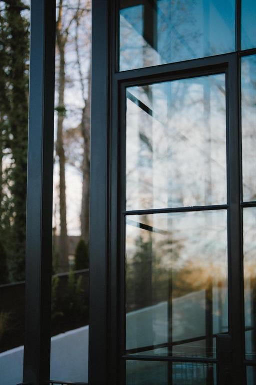 843 Yorkshire Road Northeast Atlanta, GA 30306 - Photo 60 of 65 a bathroom with a glass shower door