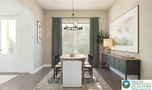 a dining room with furniture and window