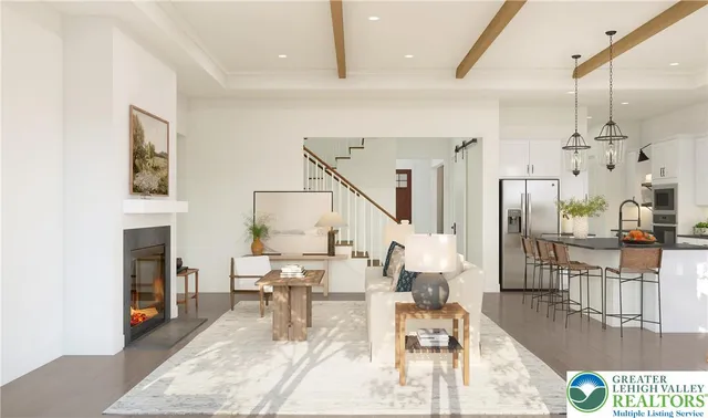 a living room with furniture a fireplace and a table