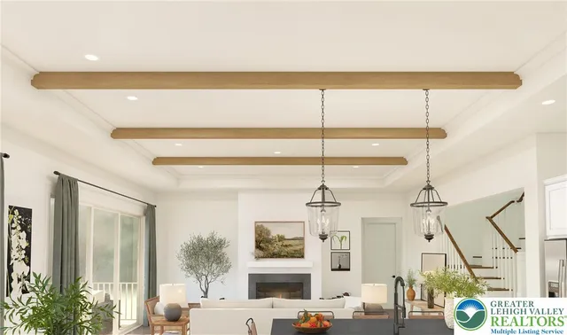 a very nice looking room with a large window and potted plants