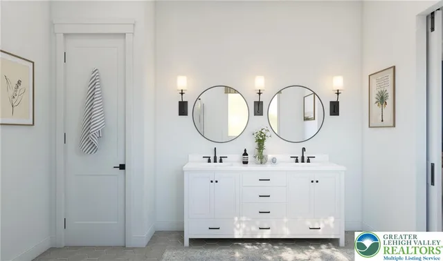 a bathroom with a sink mirror and a mirror