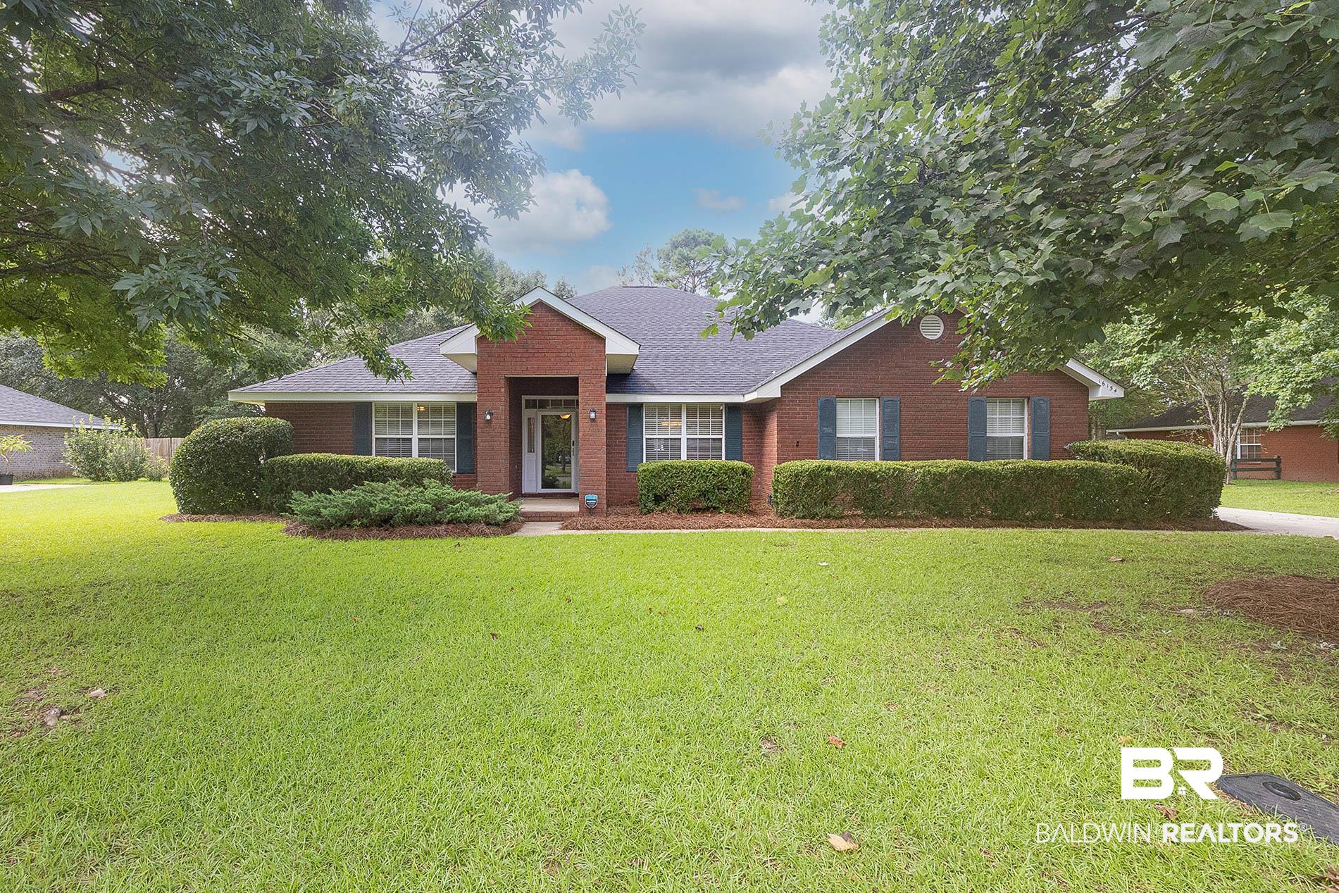 16154 Parke Boulevard Foley, AL 36535 - Photo 1 of 44 Single story home featuring beautiful mature trees and landscaped yard.