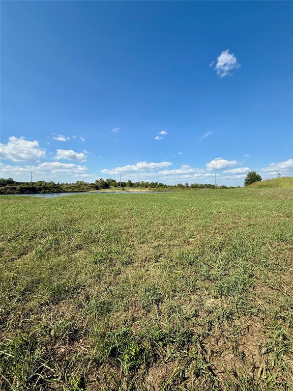 Lot 9 Co Road Quinlan, TX 75474 - Photo 5 of 7 a view of an ocean from a yard