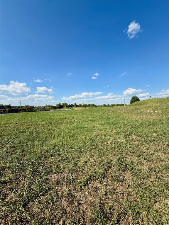 Lot 9 Co Road Quinlan, TX 75474 - Photo 6 of 7 a view of a lake with a big yard