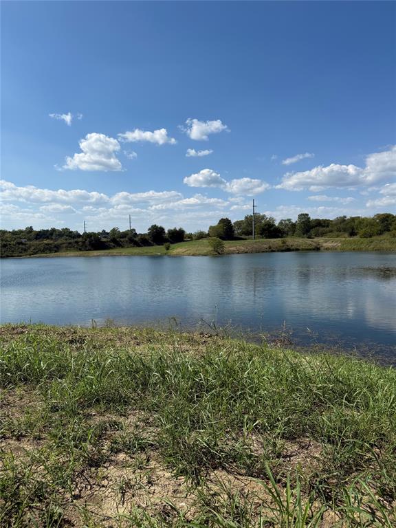 Lot 9 Co Road Quinlan, TX 75474 - Photo 7 of 7 a view of a lake with sunset