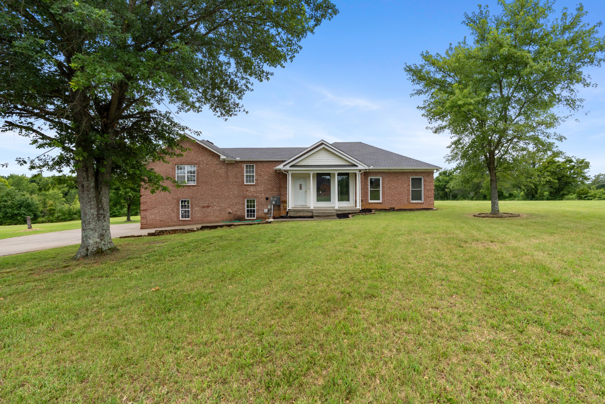 4602 Washington Road Springfield, TN 37172 - Photo 52 of 63 a front view of a house with a garden