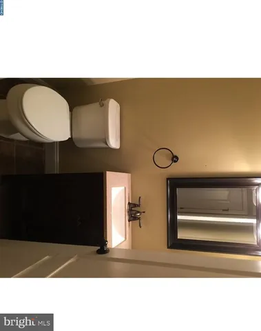 a black and white photo of a living room