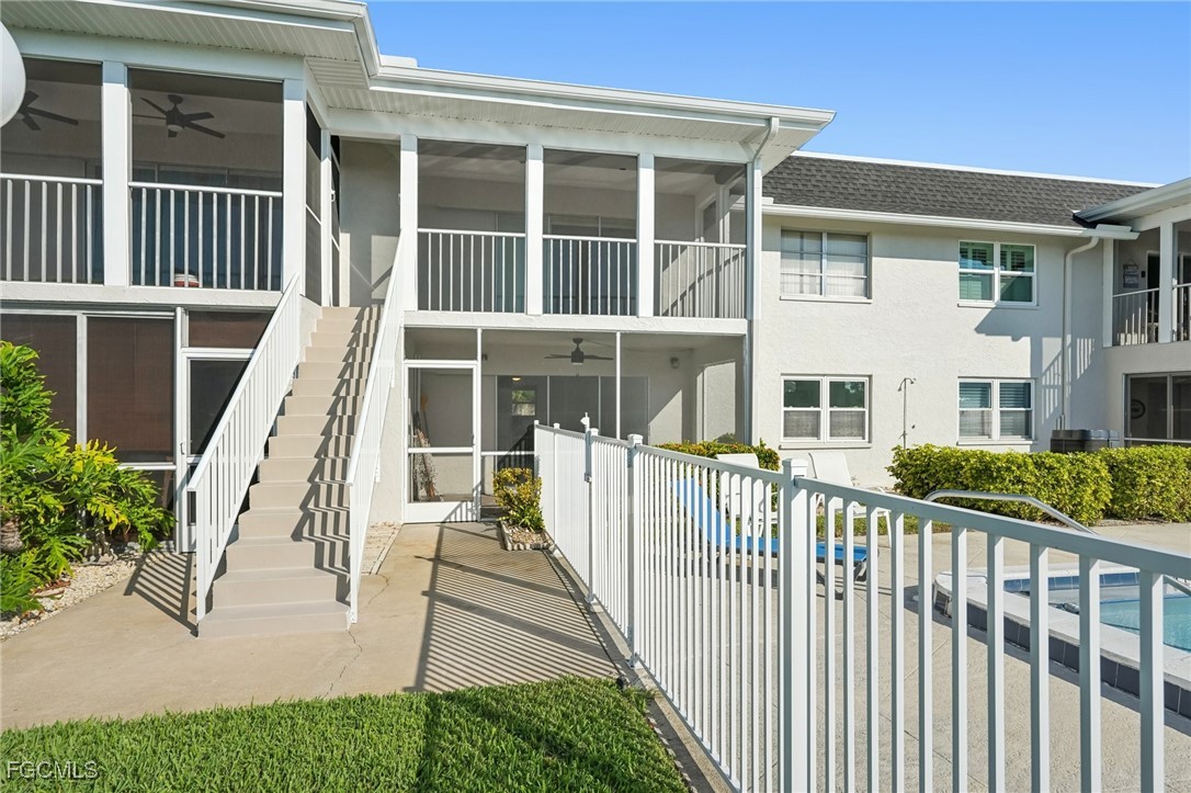 1006 Southeast 46th Street, Unit 1C Cape Coral, FL 33904 - Photo 18 of 26 a view of a house with wooden deck and deck