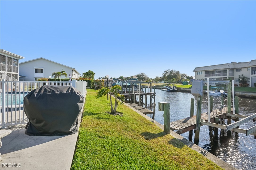 1006 Southeast 46th Street, Unit 1C Cape Coral, FL 33904 - Photo 20 of 26 a view of a balcony with chairs