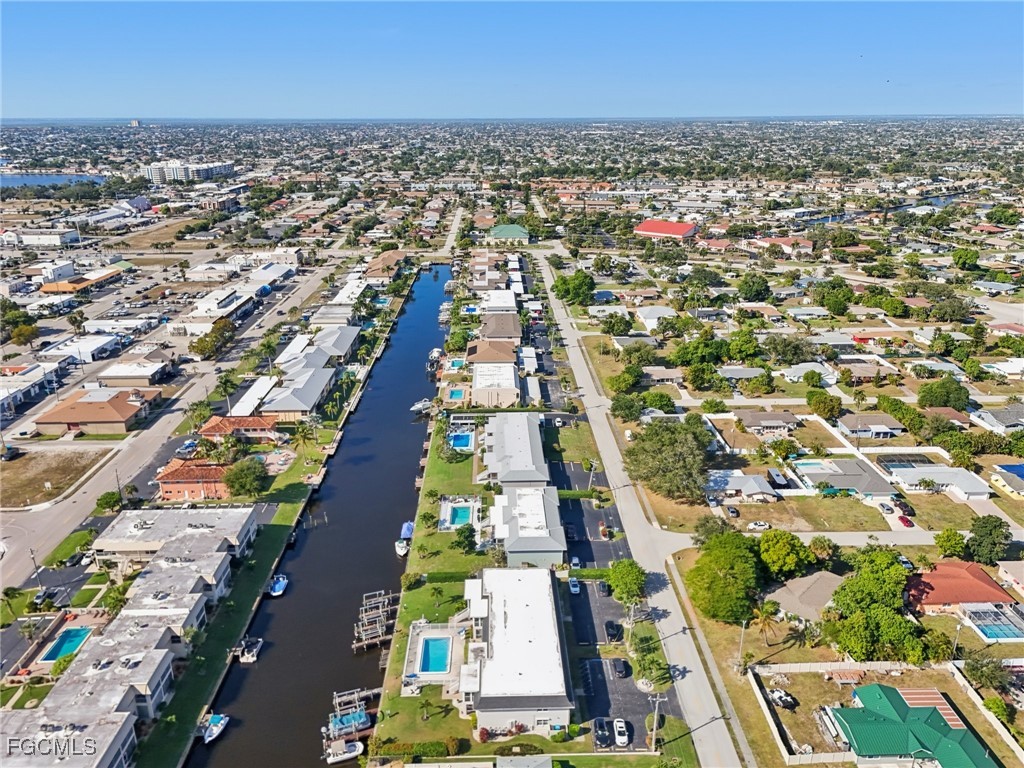 1006 Southeast 46th Street, Unit 1C Cape Coral, FL 33904 - Photo 24 of 26 an aerial view of residential houses with outdoor space