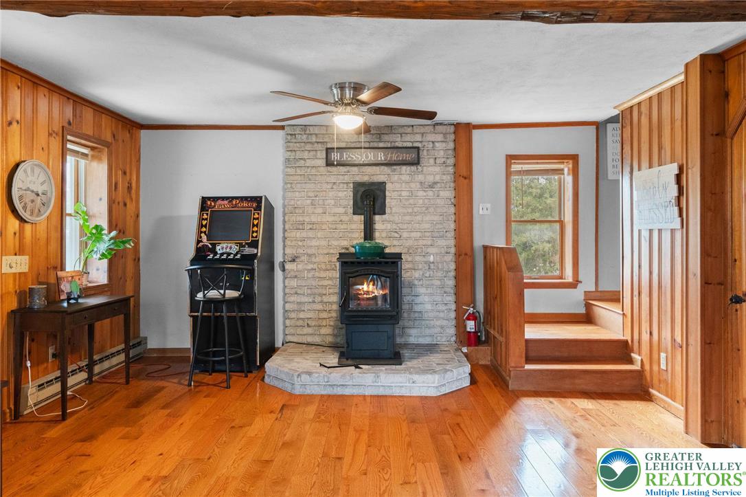368 Meyer Road Nazareth, PA 18064 - Photo 13 of 66 a living room with fireplace furniture and a window