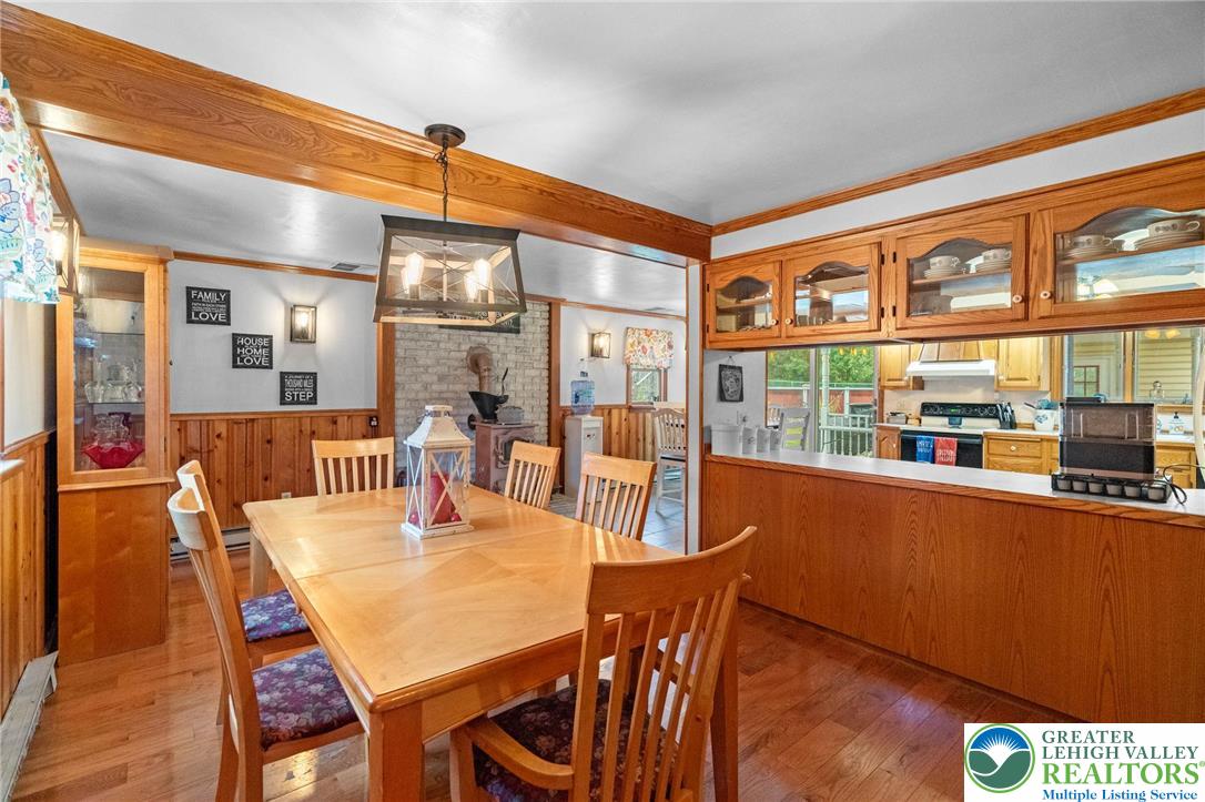 368 Meyer Road Nazareth, PA 18064 - Photo 18 of 66 a dining room with furniture a kitchen view and wooden floor