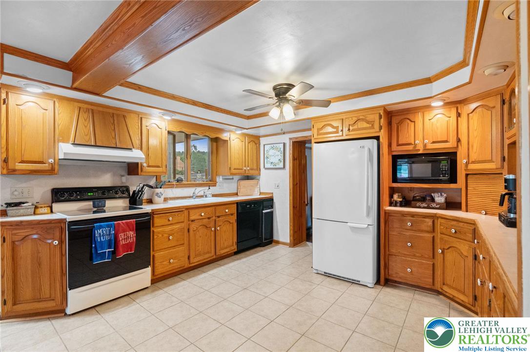 368 Meyer Road Nazareth, PA 18064 - Photo 20 of 66 a kitchen with stainless steel appliances granite countertop a refrigerator and a stove top oven