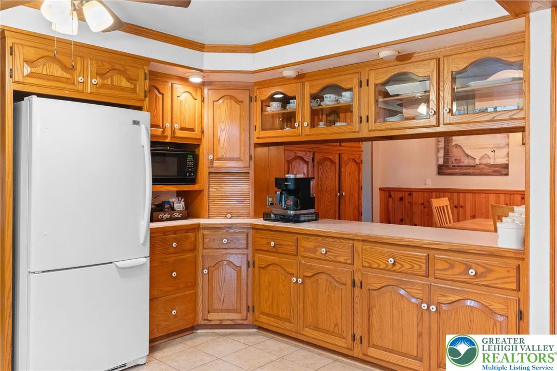 368 Meyer Road Nazareth, PA 18064 - Photo 22 of 66 a kitchen with stainless steel appliances granite countertop a refrigerator and a cabinets