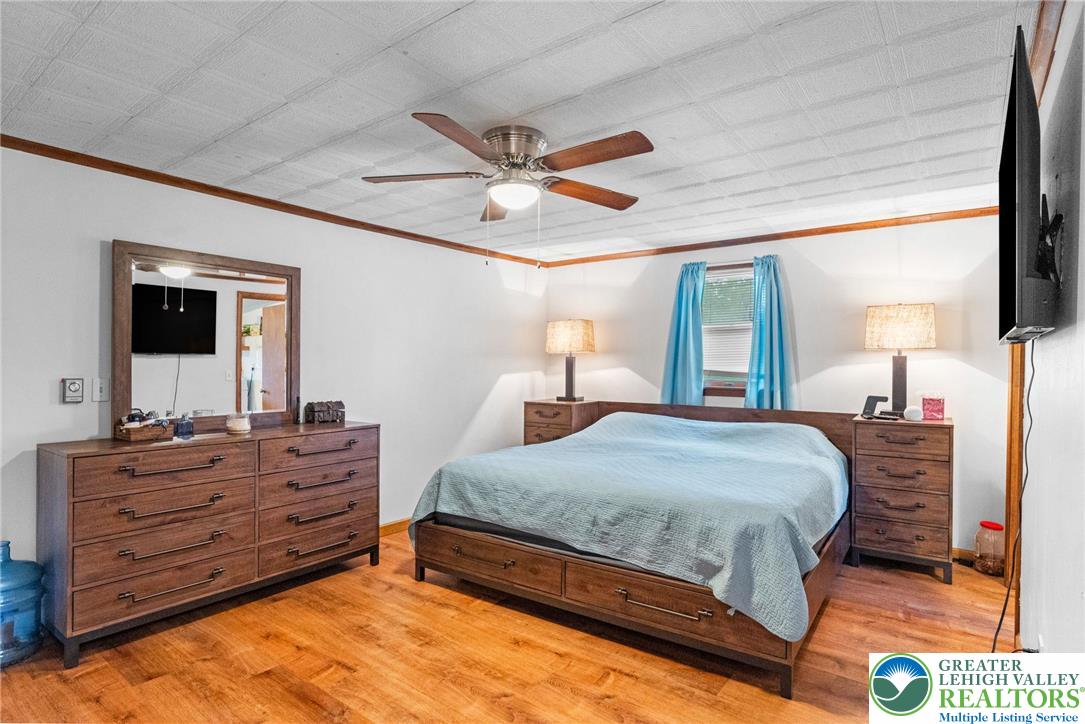 368 Meyer Road Nazareth, PA 18064 - Photo 29 of 66 a bedroom with a bed and a dresser