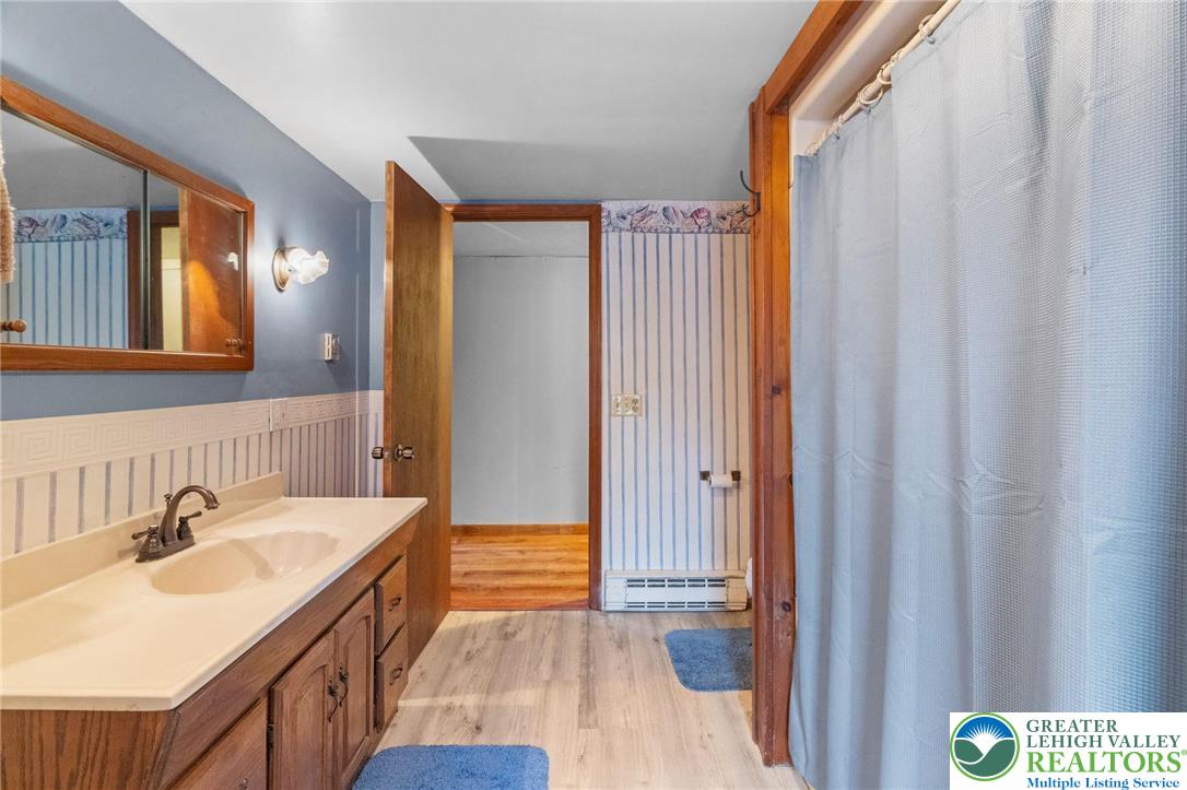 368 Meyer Road Nazareth, PA 18064 - Photo 38 of 66 a bathroom with a sink and a mirror