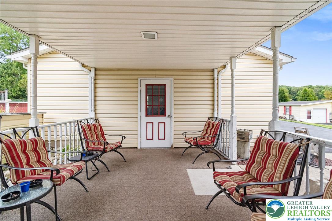 368 Meyer Road Nazareth, PA 18064 - Photo 44 of 66 a balcony with furniture and wooden floor