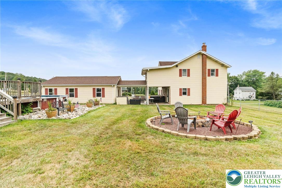 368 Meyer Road Nazareth, PA 18064 - Photo 54 of 66 a view of a house with backyard swimming pool and sitting area