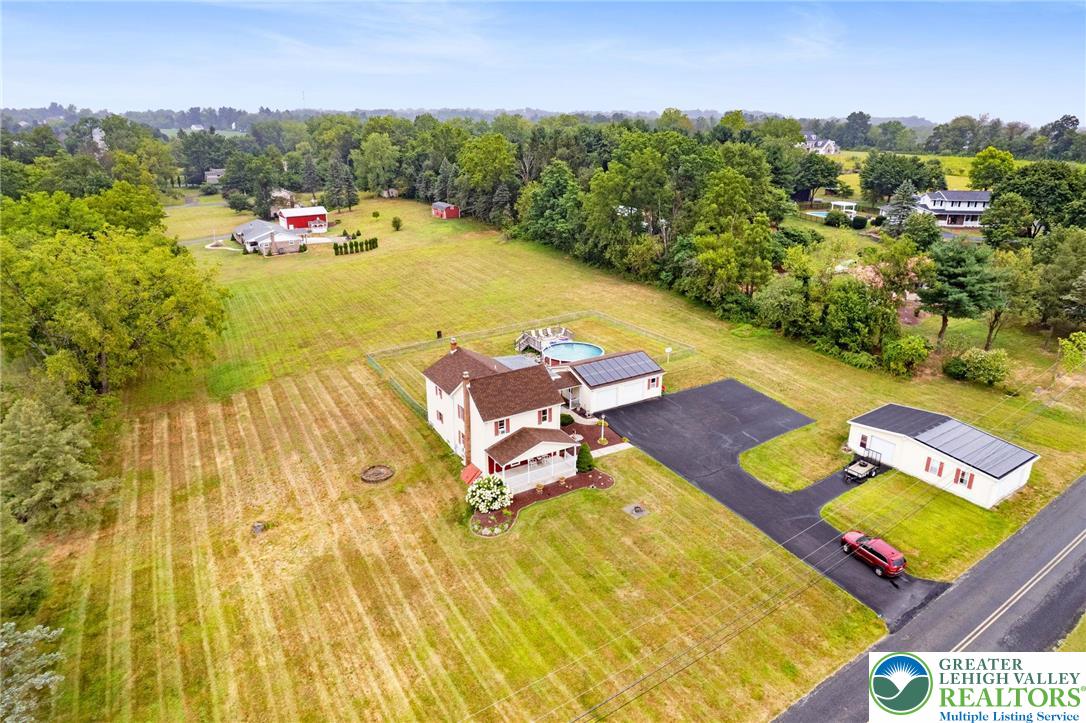 368 Meyer Road Nazareth, PA 18064 - Photo 66 of 66 an aerial view of a swimming pool with a yard