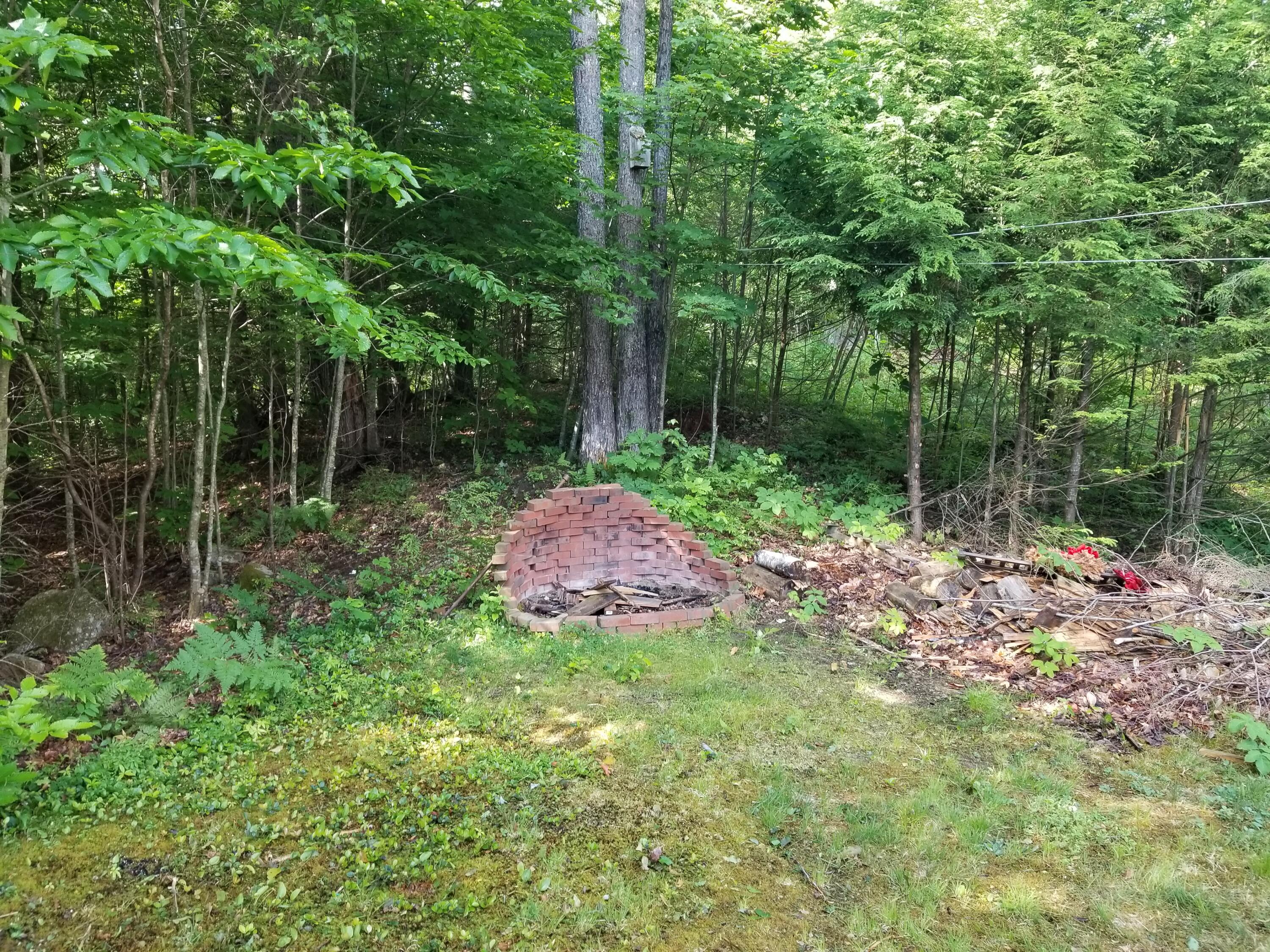 659 Canton Point Road Canton, ME 04221 - Photo 6 of 35 Outside Fire Pit