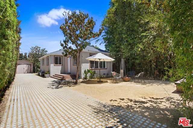 a view of a house with snow on the floor