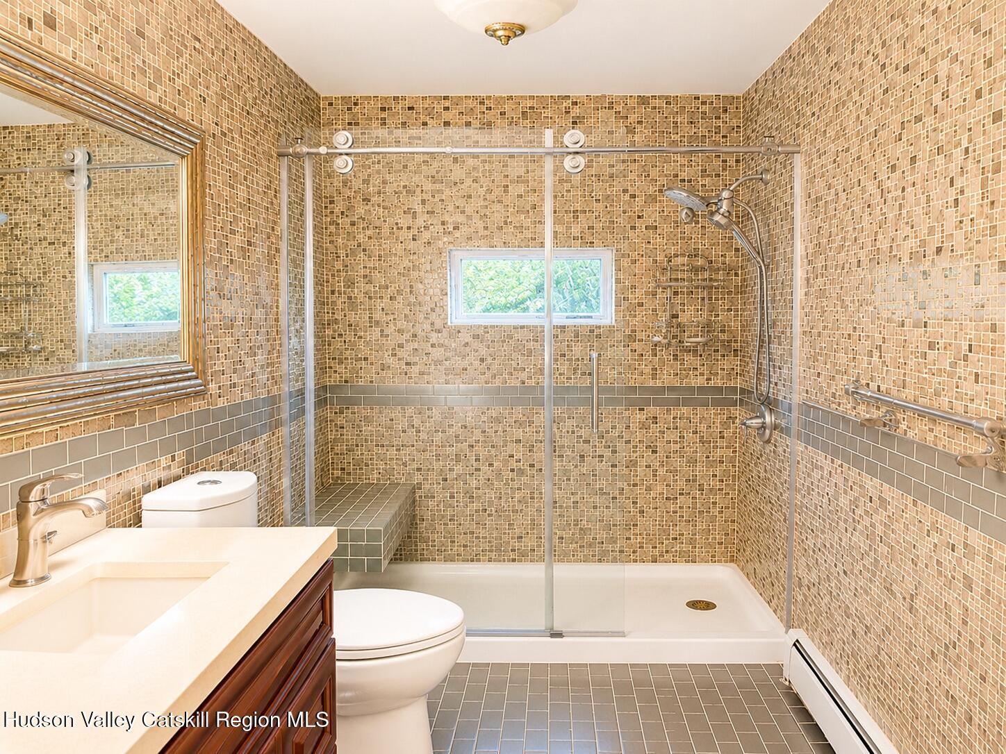 14 Park Road Chichester, NY 12416 - Photo 13 of 20 a bathroom with a sink toilet and shower