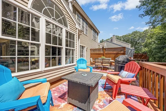 a balcony view with a seating space
