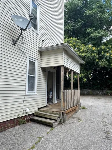 a view of a car in front of a house