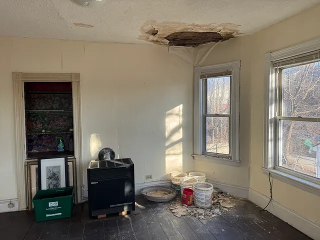 a view of a room that has a window in it