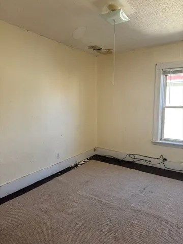 a kitchen that has a sink and a stove