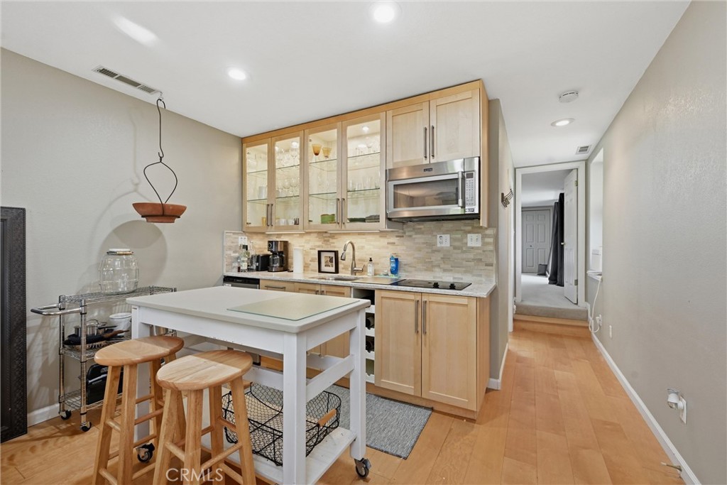 17432 Greenridge Road Hidden Valley Lake, CA 95467 - Photo 56 of 72 a kitchen with stainless steel appliances granite countertop a sink stove and refrigerator