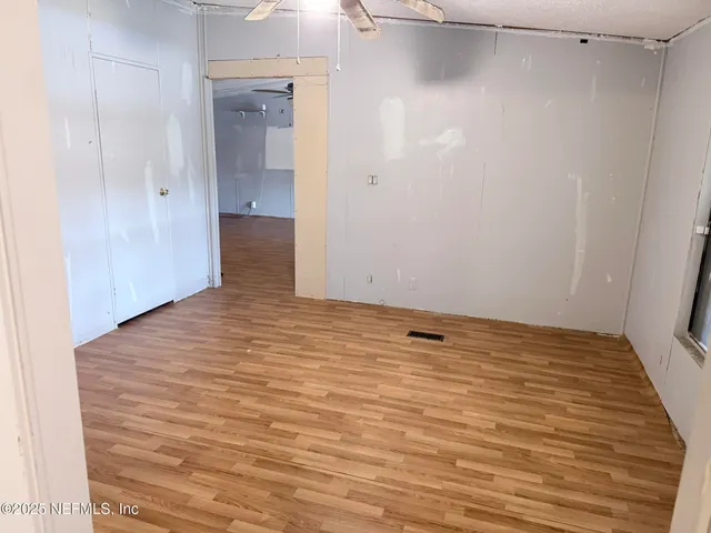 a view of a room with an empty space