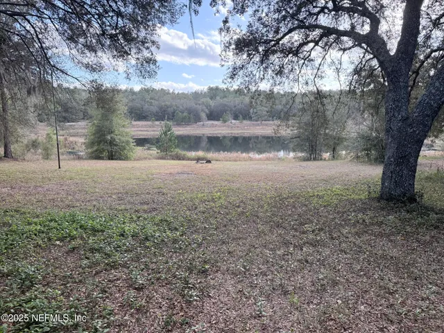 a view of outdoor space and yard