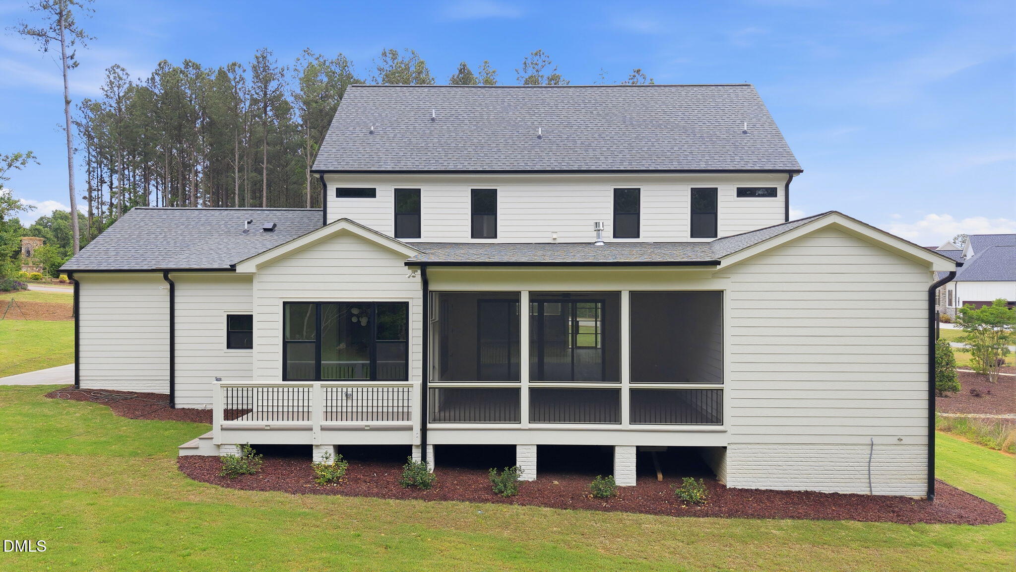 1304 Sanctuary Pond Drive Raleigh, NC 27606 - Photo 47 of 52 a front view of a house with a garden