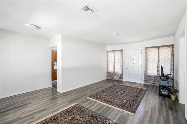 a view of an empty room and window