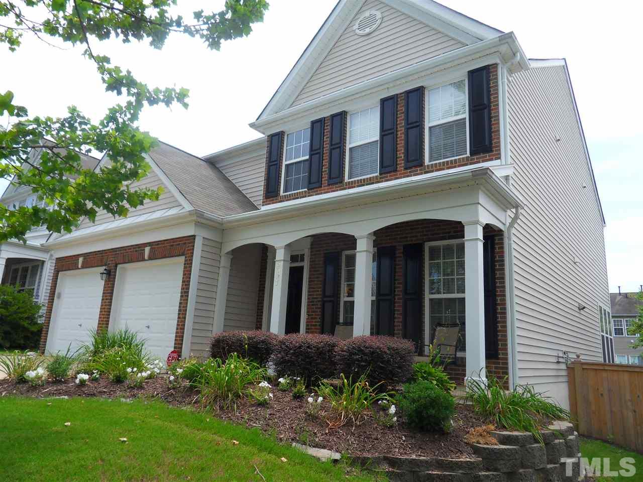 5327 Griffith Park Road Raleigh, NC 27613 - Photo 1 of 25 a front view of a house with garden