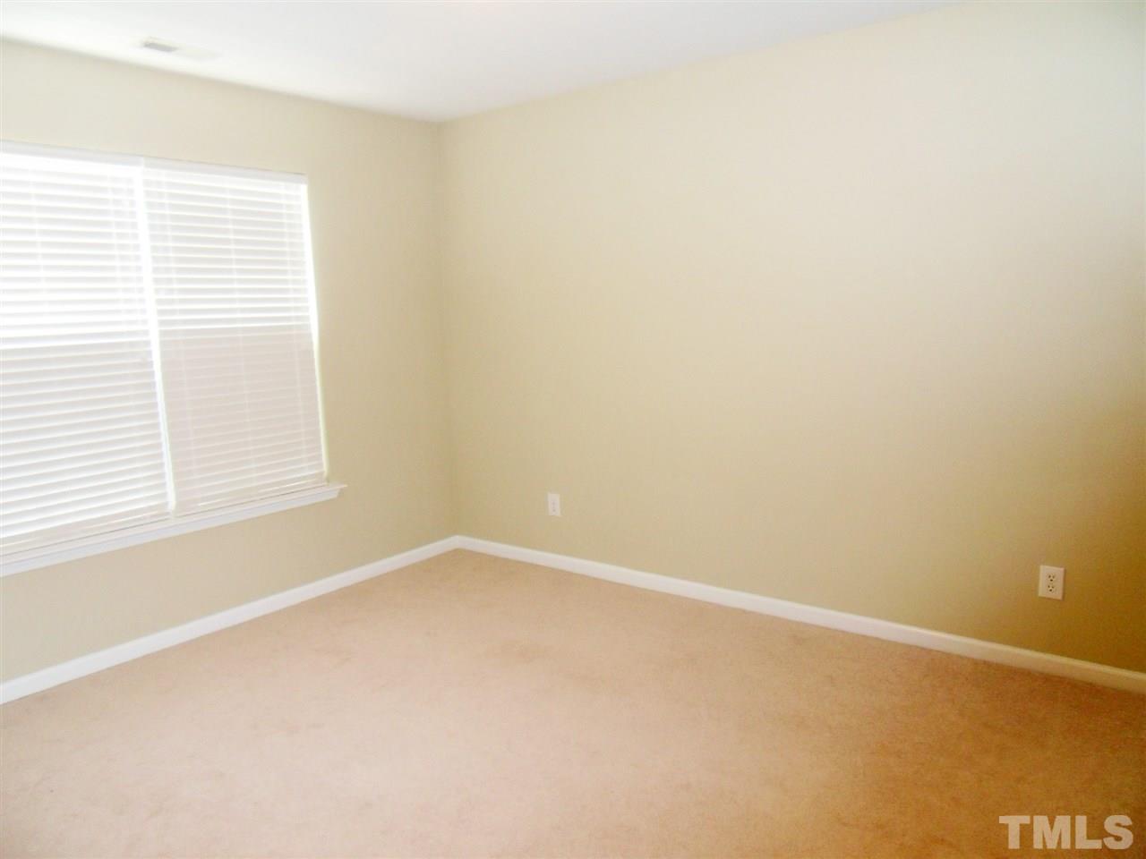 5327 Griffith Park Road Raleigh, NC 27613 - Photo 12 of 25 an empty room with a window