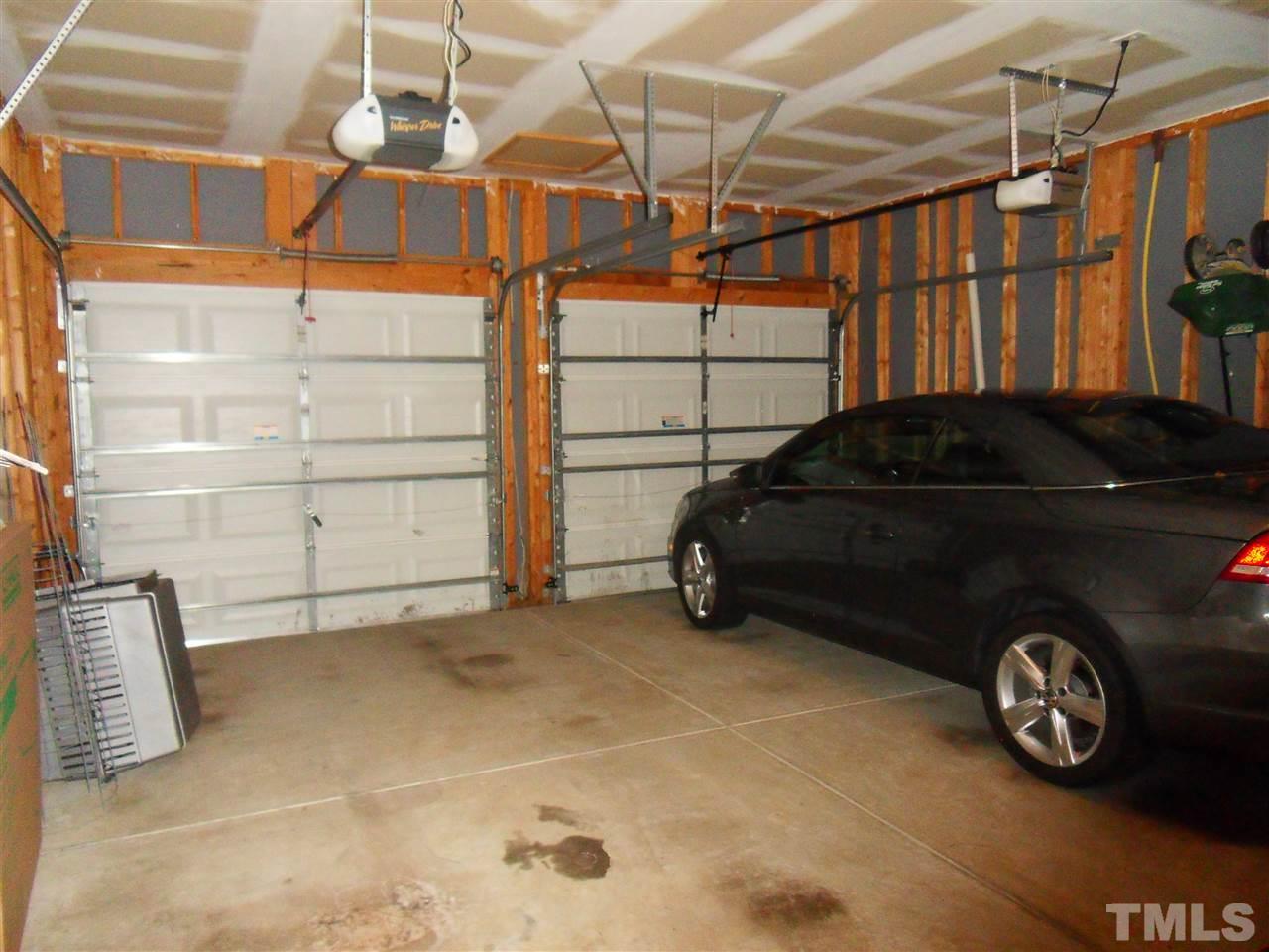 5327 Griffith Park Road Raleigh, NC 27613 - Photo 22 of 25 a car parked in a garage